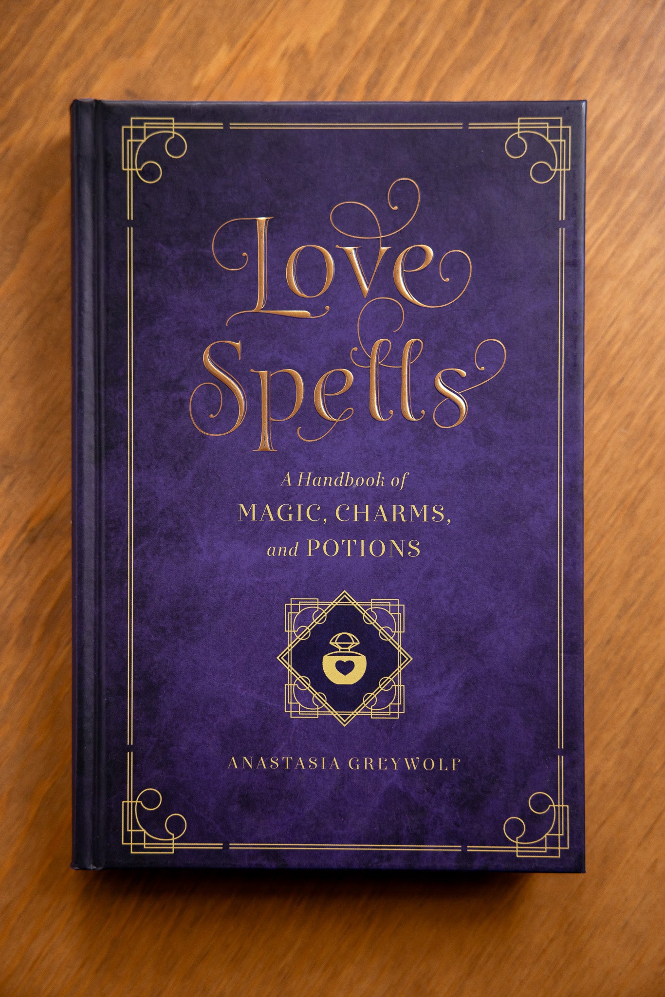 Love Spells: A Handbook of Magic Charms and Potions by Anastasia Greywolf