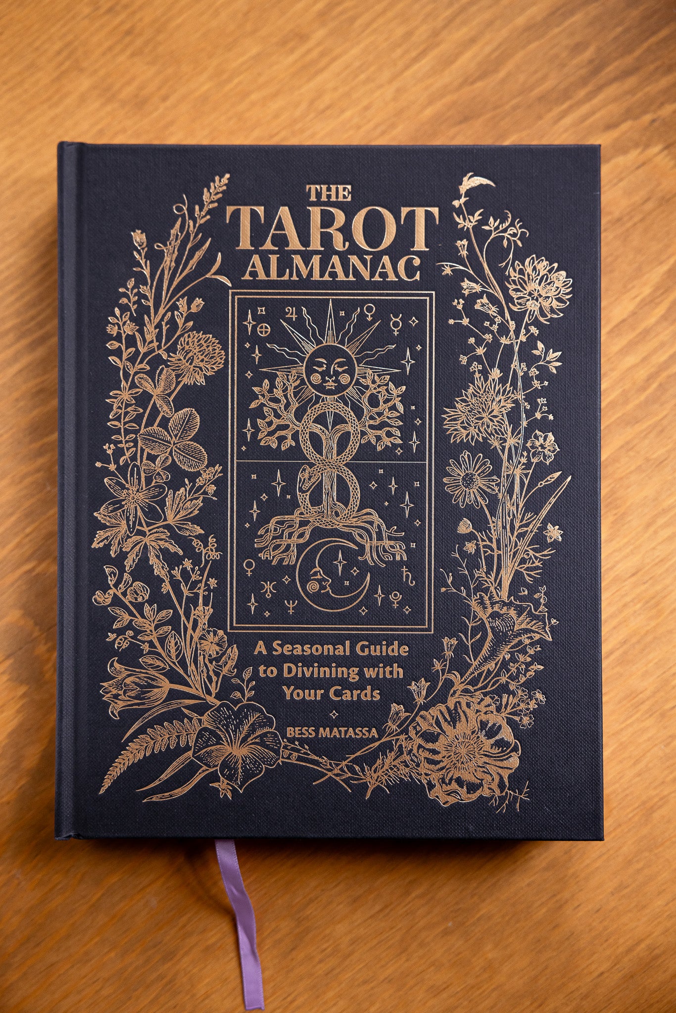 The Tarot Almanac: A Seasonal Guide to Divining with Your Cards by Bess Matassa